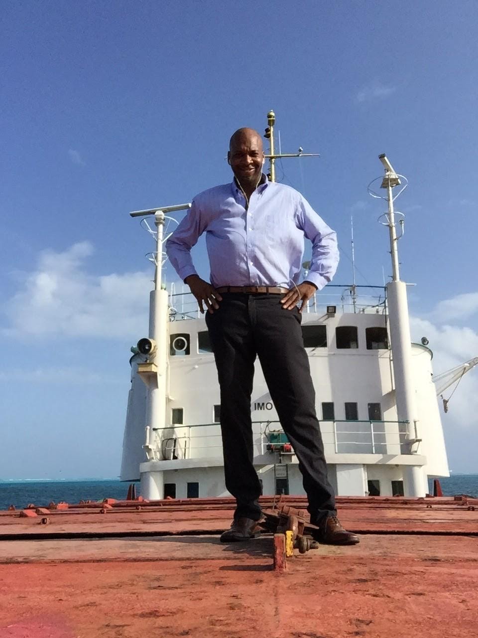 Founder standing on the deck of MV Anjelica Express